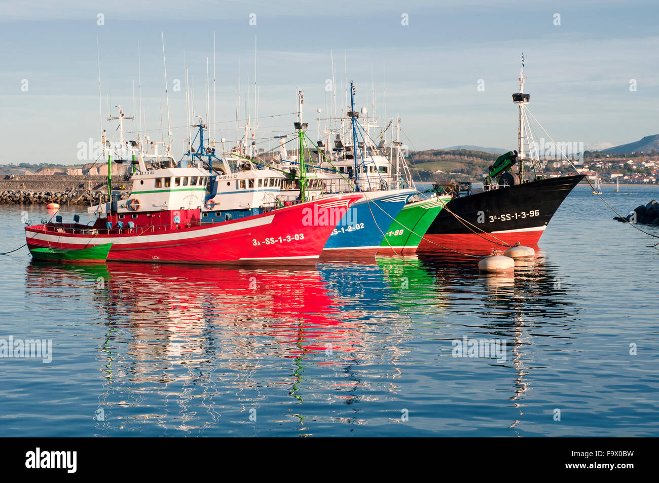 Horizontal picture of commercial tuna fishing vessels in port. Hondarribia, Basque Country, Spain. Stock Photo