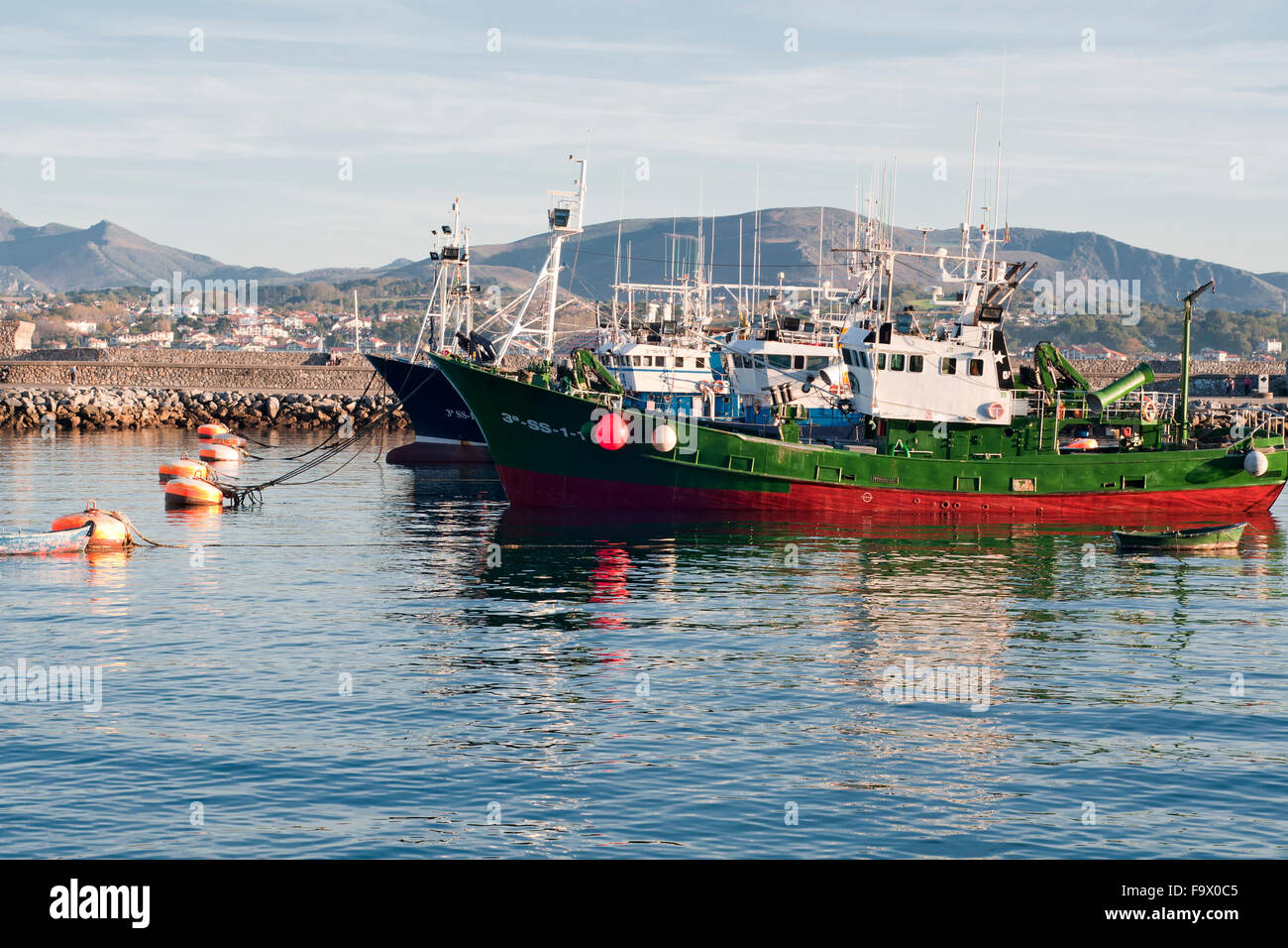 Horizontal picture of commercial tuna fishing vessels in port. Hondarribia, Basque Country, Spain. Stock Photo