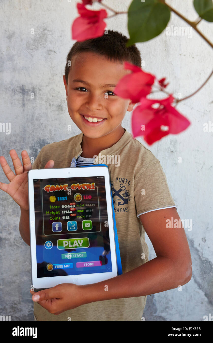 8-year-old boy using a digital tablet Stock Photo - Alamy