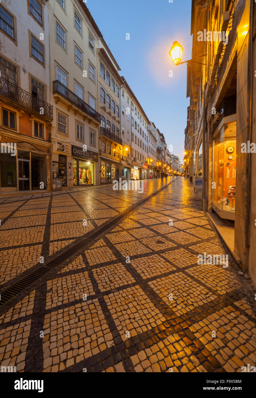 Portugal, Coimbra, Rua Ferreira Borges, shopping street in the evening