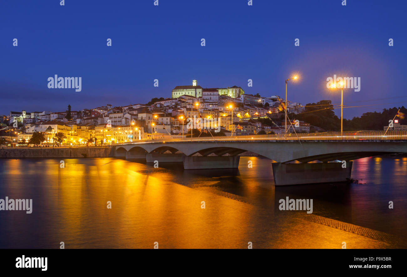 Portugal, Coimbra, historical old town, Mondego river and bridge Santa Clara in the evening Stock Photo