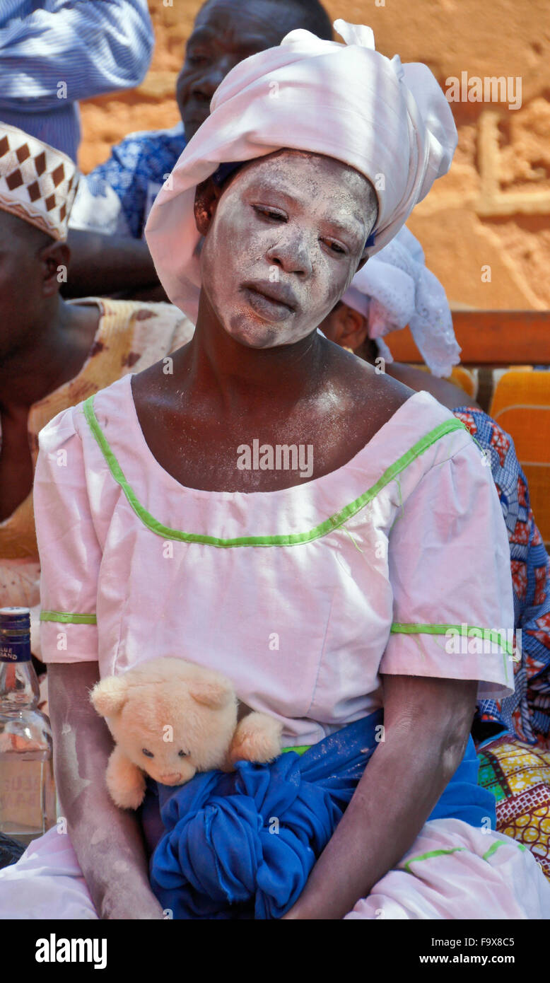 Ewe woman possessed by spirits in Tron vodun (voodoo) ceremony, Lome, Togo Stock Photo
