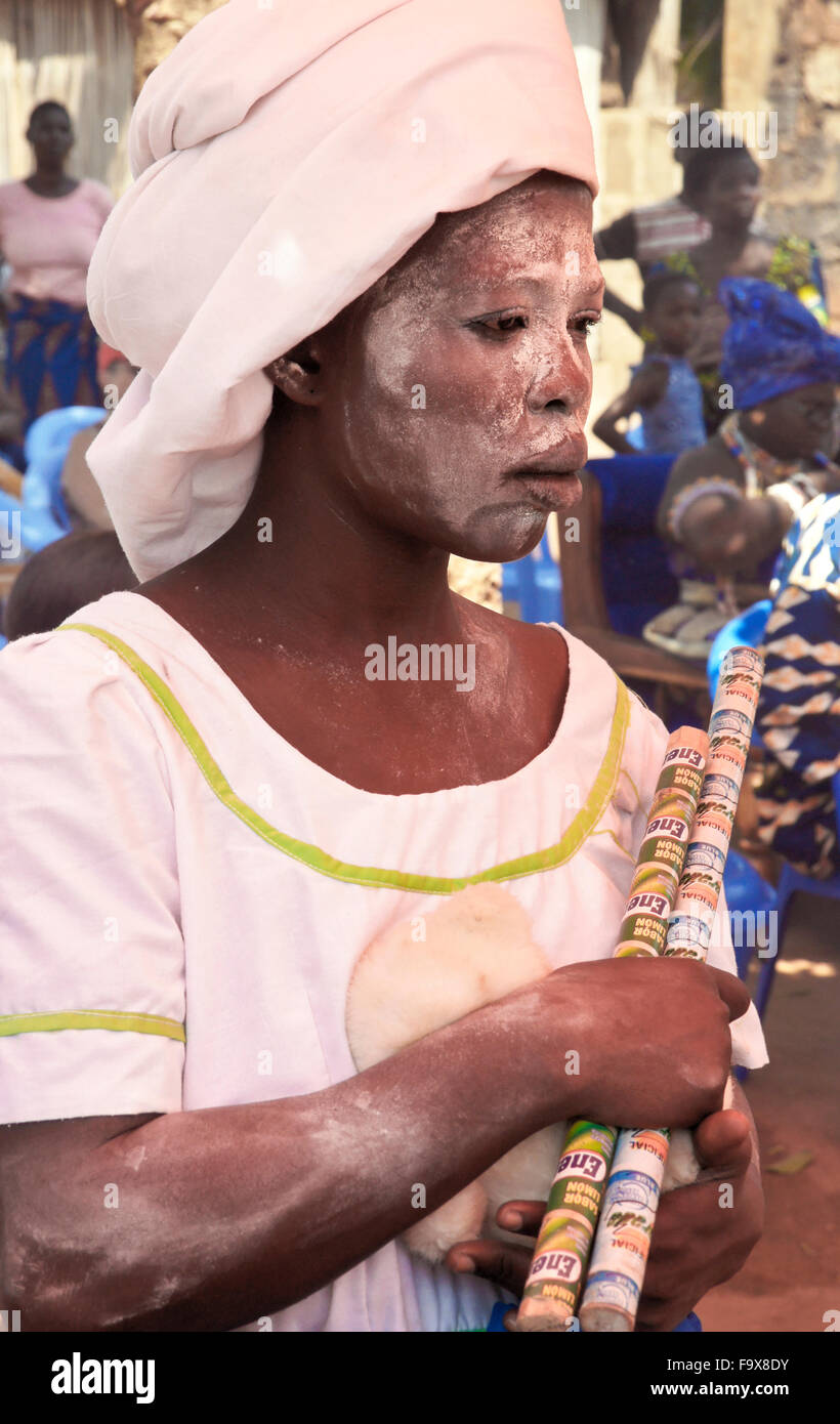 Ewe woman possessed by spirits in Tron vodun (voodoo) ceremony, Lome, Togo Stock Photo