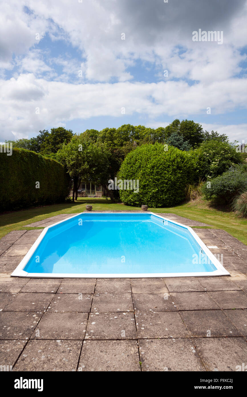 UK real estate. Outdoor private swimming pool. Stock Photo