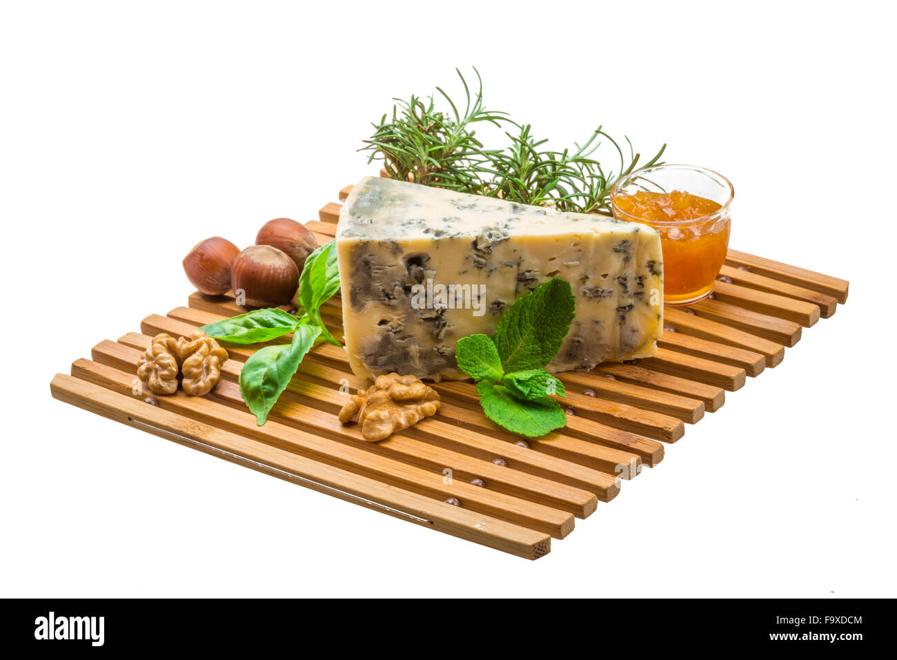 Dor blue cheese with herbs, nuts and honey Stock Photo - Alamy
