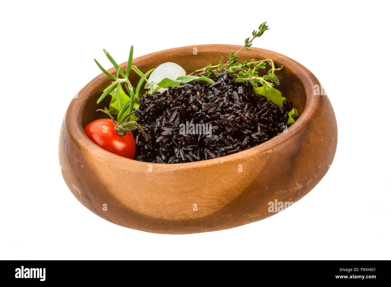 Black boiled rice with thyme Stock Photo