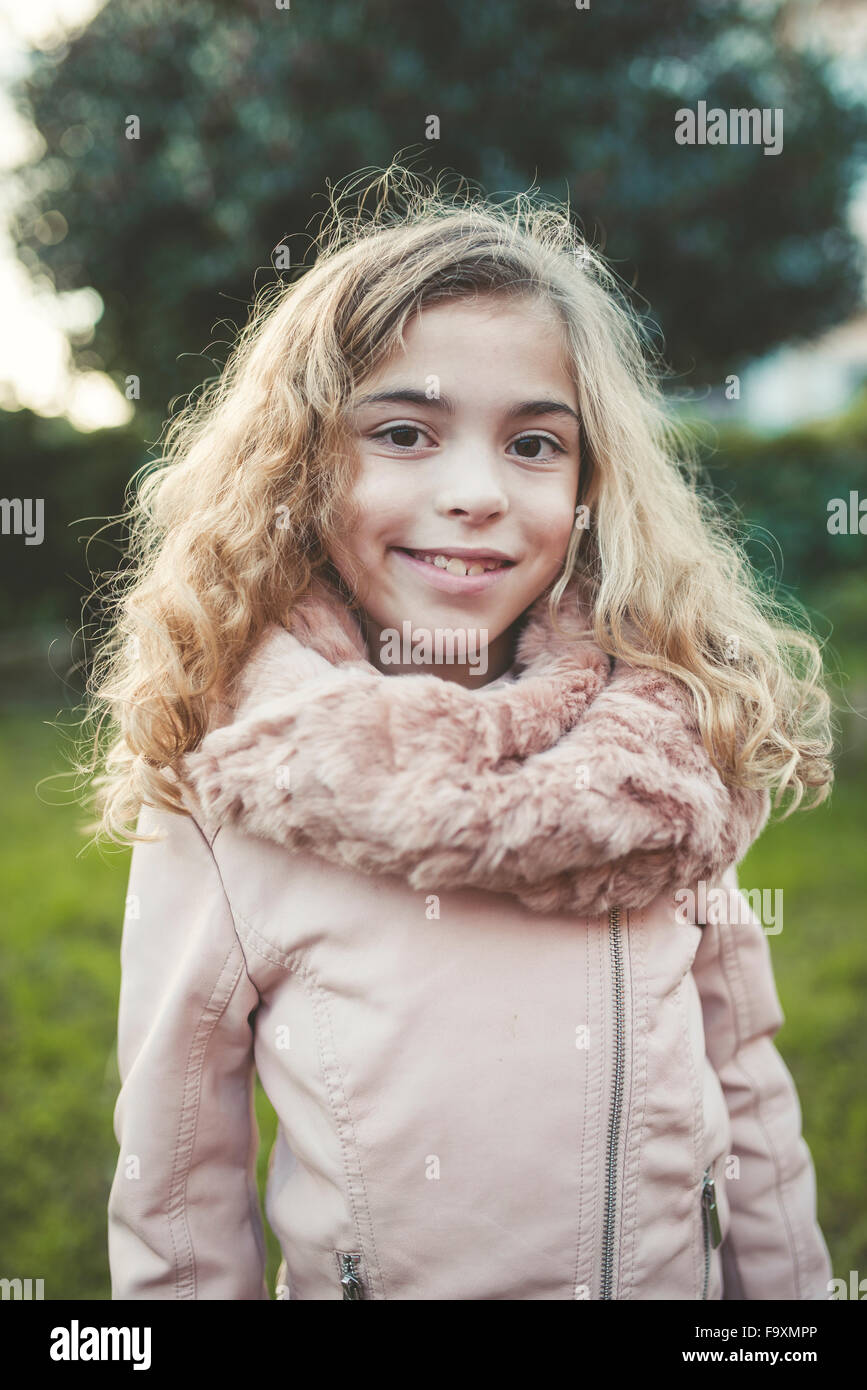 Portrait of smiling blond girl Stock Photo - Alamy