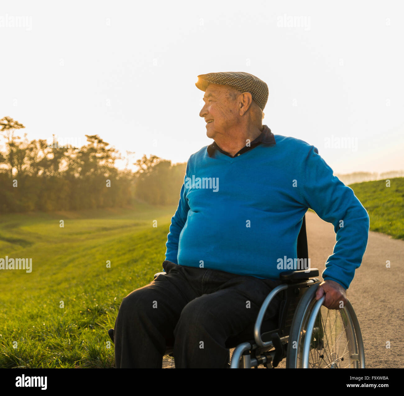 Old man wheelchair thinking hi-res stock photography and images - Alamy