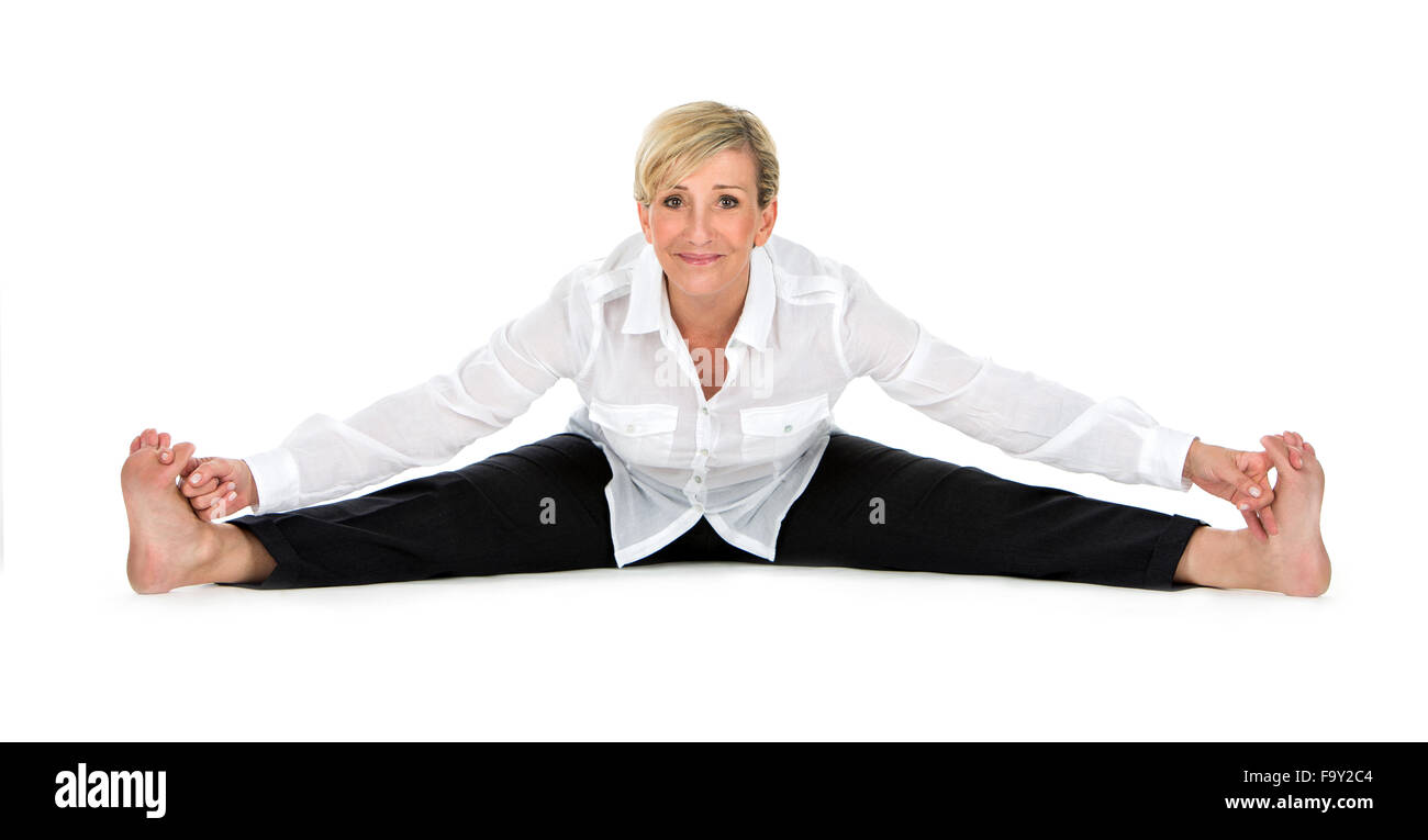 manager woman doing yoga at white background Stock Photo