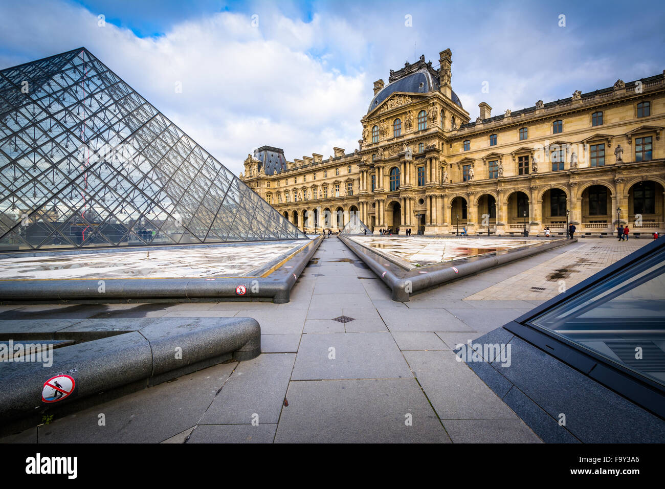 The Louvre Pyramid, in the courtyard of the Louvre Palace, in Paris, France. Stock Photo