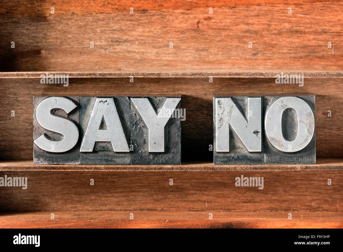say no phrase made from metallic letterpress type on wooden tray Stock Photo
