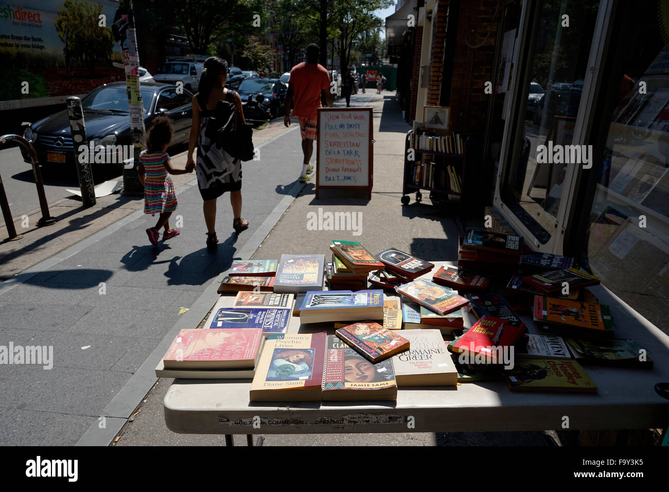 A street vendor selling second hand books in Williamsburg, Brooklyn, New York,USA Stock Photo