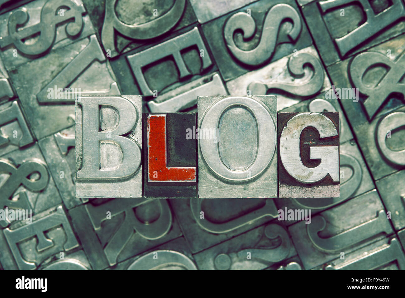 blog word concept made from metallic letterpress blocks on many letters background Stock Photo