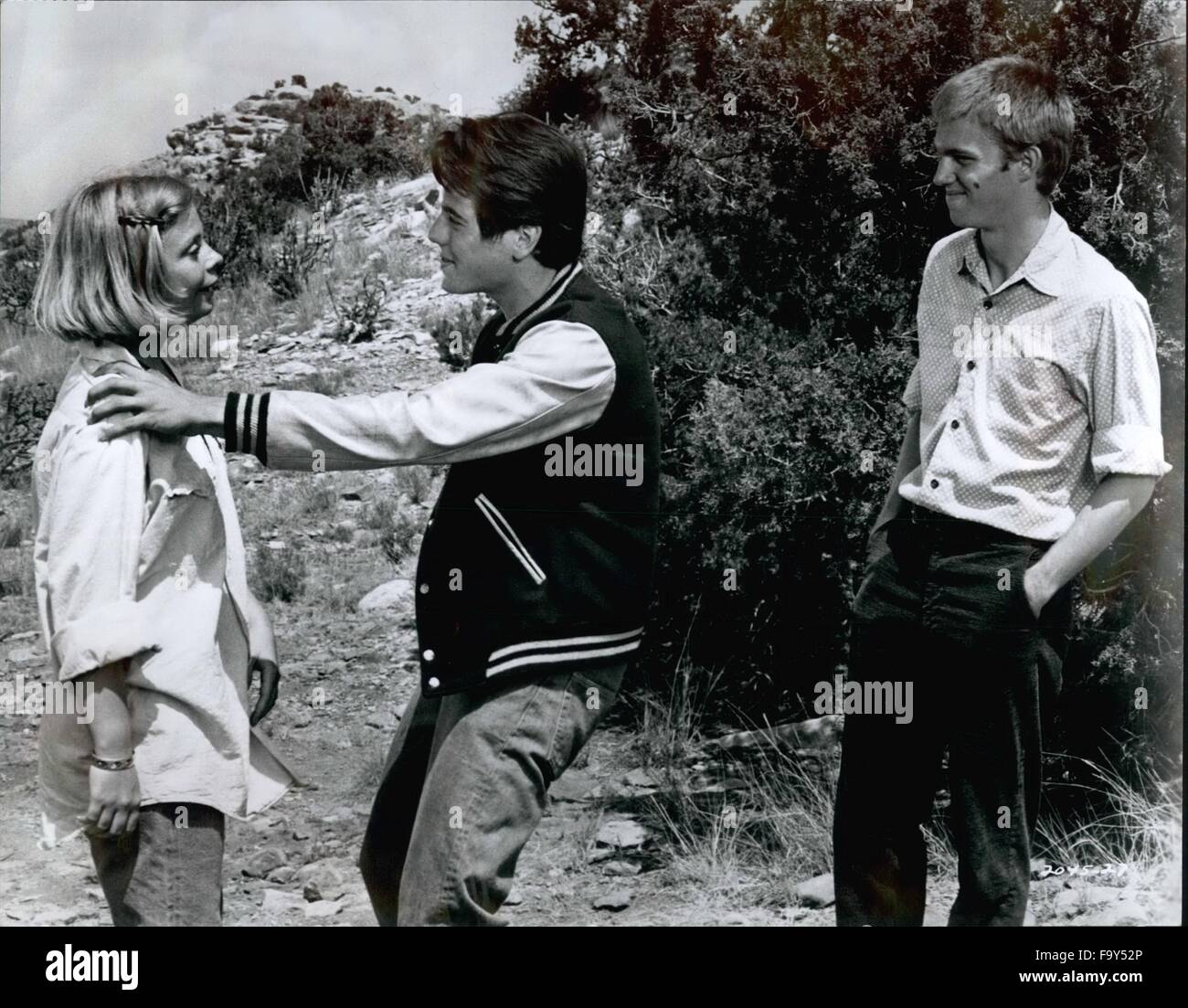 1968 - Richard Thomas and Catherine Bums watch anxiously as Desi Arnaz, Jr. gets ready for his turn at the game of Gallina, daring to run into the town dump and place his hand on the rotting carcass of a dead cow. A scene from Hal Wallis' Production in Technicolor of ''Red Sky At Morning'' for Universal, starring as the young ones Richard Thomas, Catherine Burns and Desi Amaz, Jr., and starring as the adults Richard Crenna, Claire Bloom, John Colicos, Harry Guardino, Strother Martin and Nehemiah Persoff. James Goldstone directed the film version of Richard Bradford's best-selling novel from a  Stock Photo