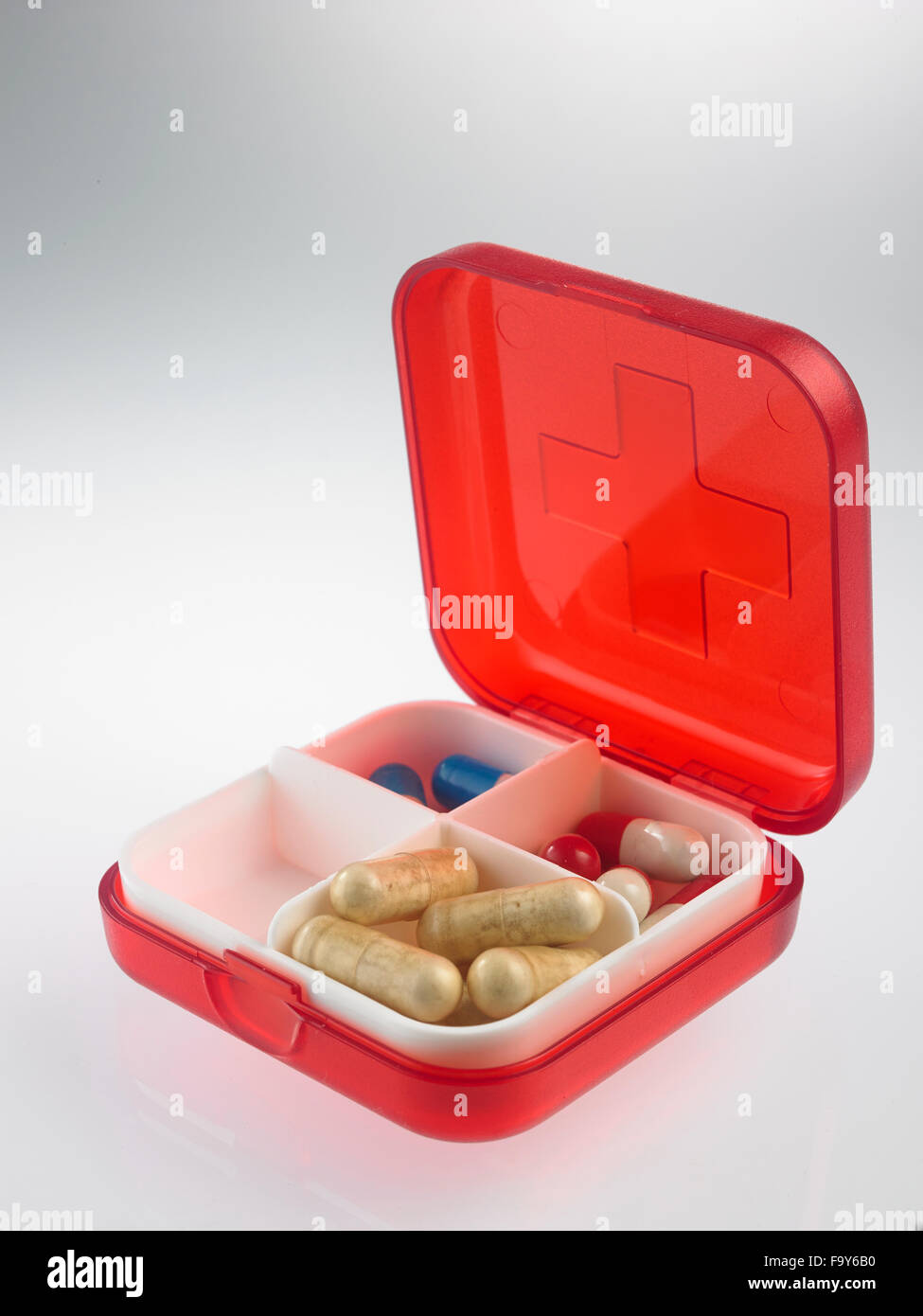 Cincinnati Reds Pill Box red pill box with medicine Stock Photo - Alamy