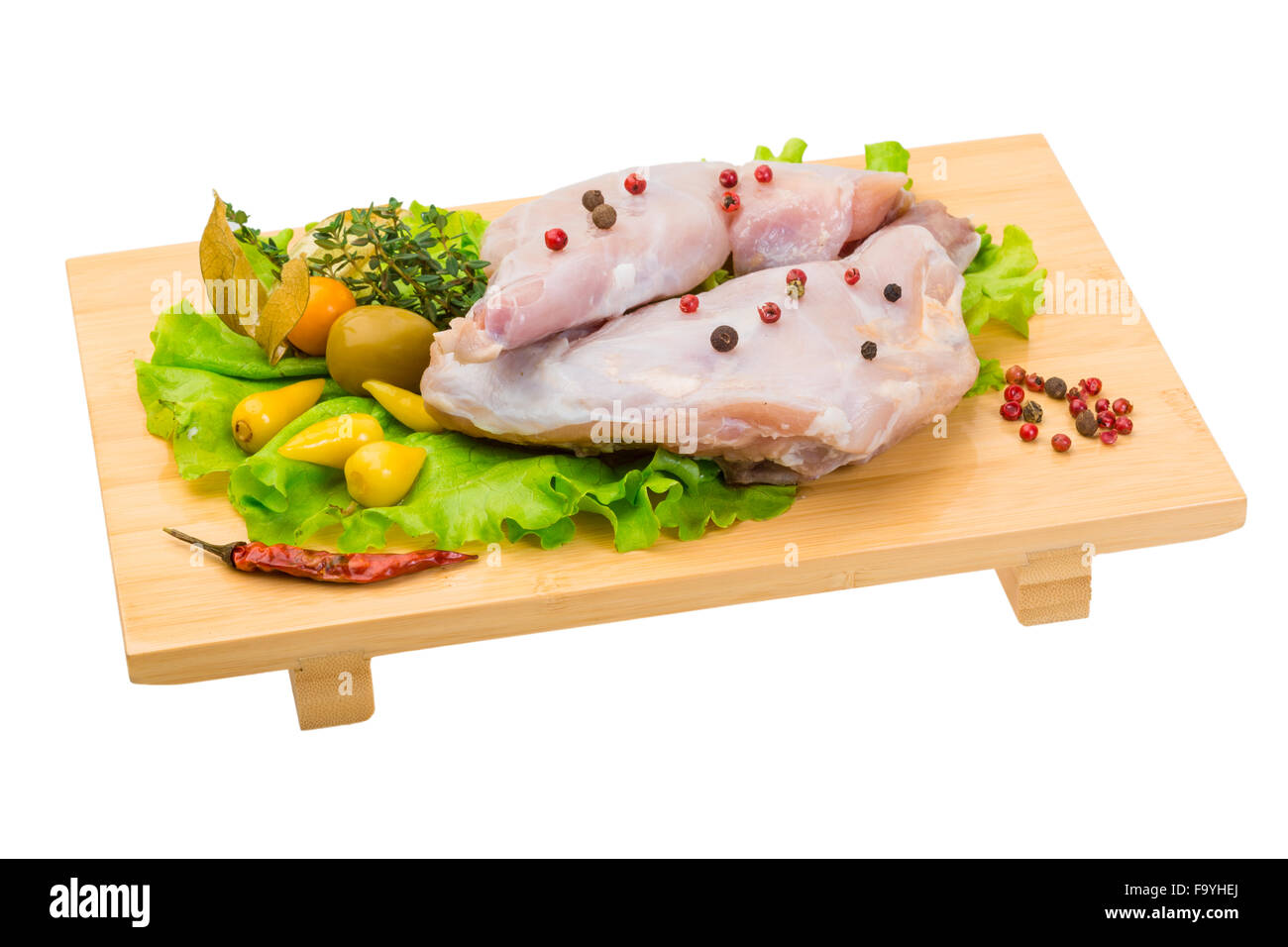 Raw rabbit meat with herbs and spices Stock Photo Alamy