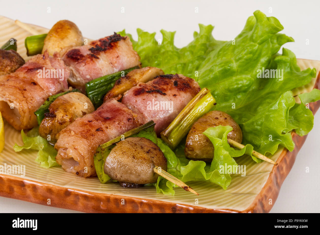 Bacon wrapped grilled Scallops with mushrooms and bacon Stock Photo Alamy