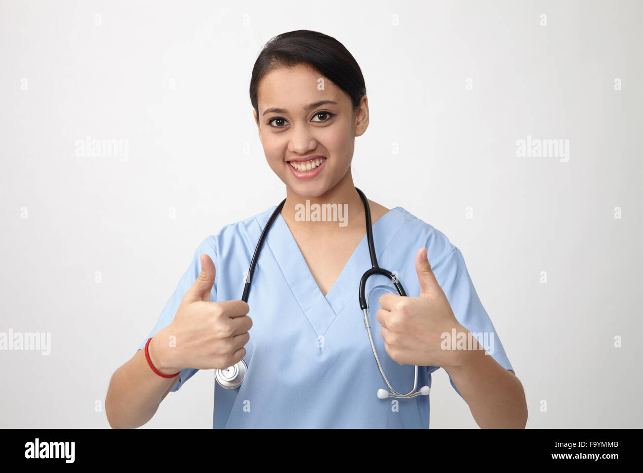 Indian woman showing thumbs up hi-res stock photography and images - Page 4  - Alamy
