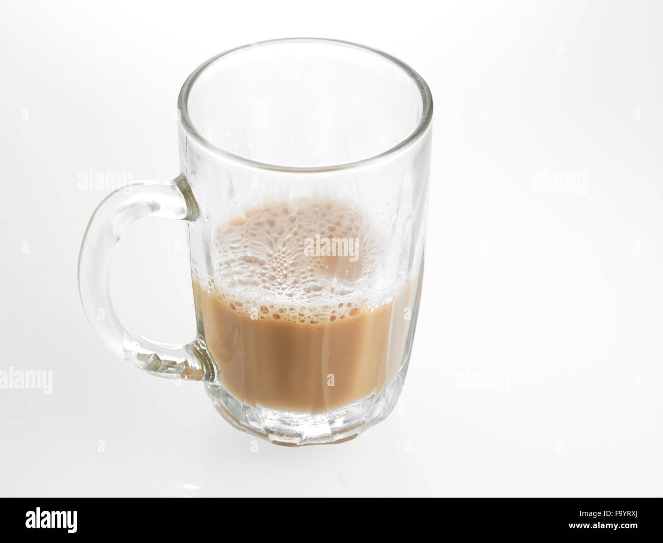 Half Glass Of Tea With Milk Or Teh Tarik In Malaysia Stock Photo Alamy Half Glass Of Tea With Milk Or Teh Tarik In Malaysia Stock Photo Alamy