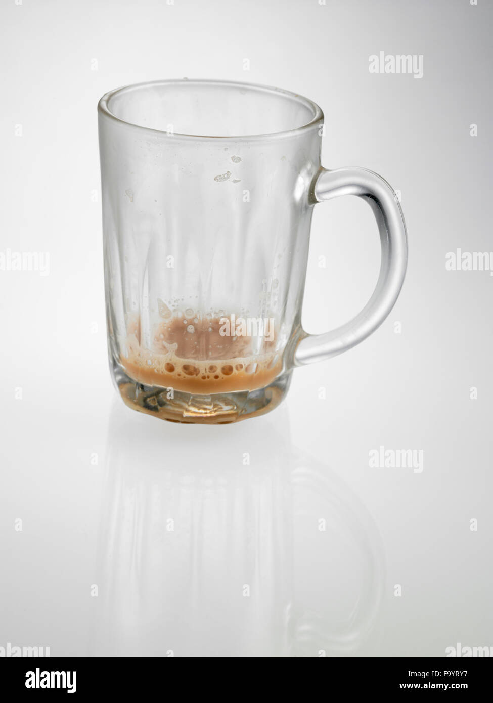 glass with little Tea with milk or Teh Tarik in Malaysia Stock Photo