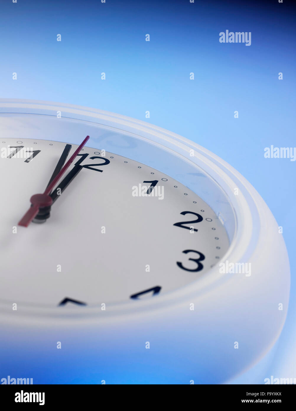 Time shows One Minute to 12 Stock Photo - Alamy