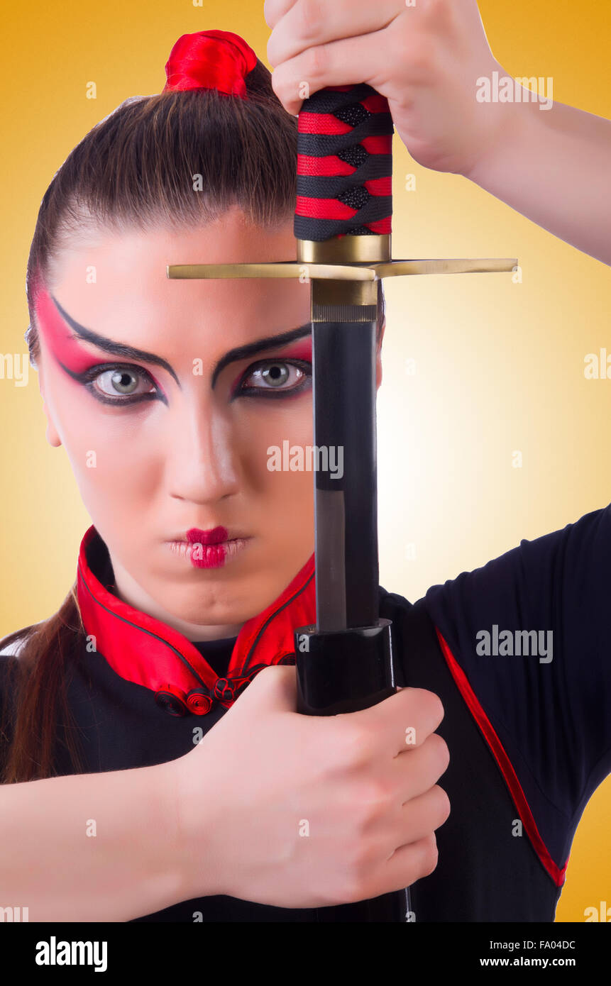 Woman in japanese martial art concept Stock Photo Alamy