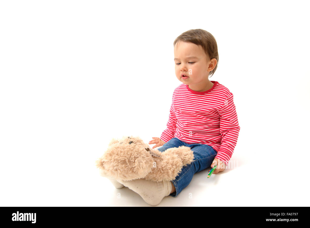 Funny baby girl playing feet hi-res stock photography and images - Alamy