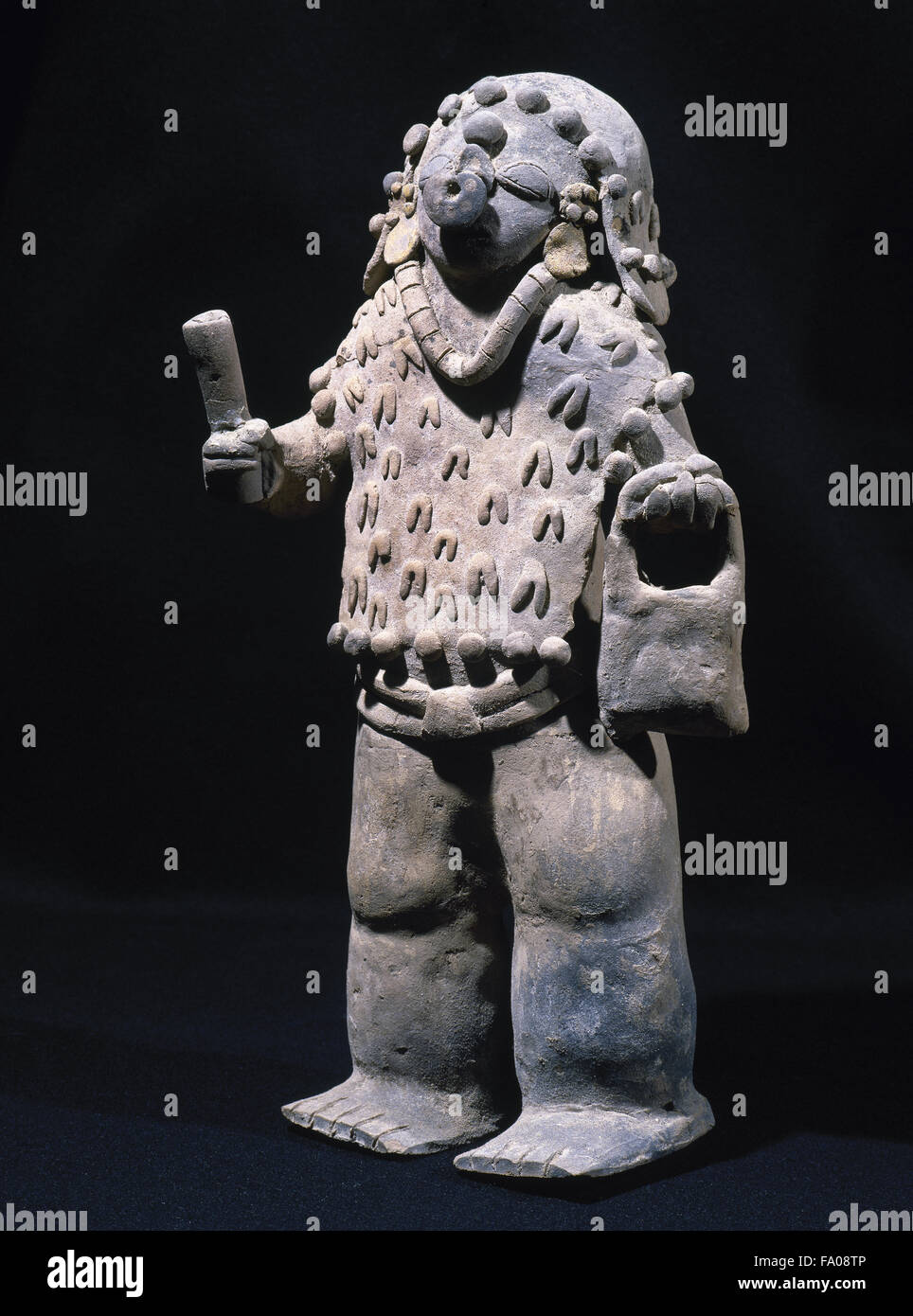 Pre-Columbian art. Pre-Incan. Jama-Coaque Culture. 500 BC-1531 AD. From Ecuador.  Male figurine. 36 x 16 cm (diamer). Stye chone. Private collection. Stock Photo