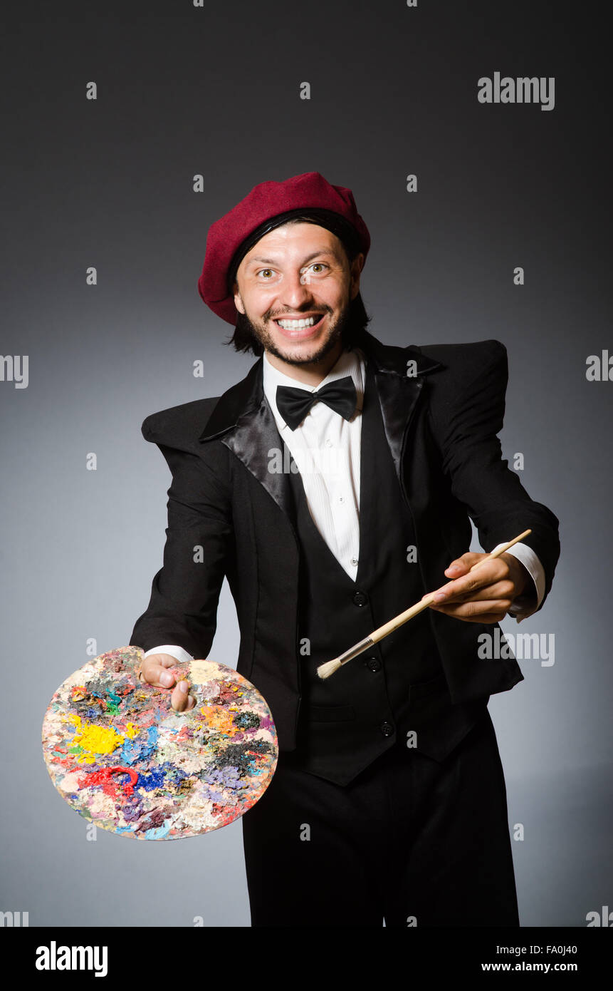 Funny artist working in the studio Stock Photo - Alamy