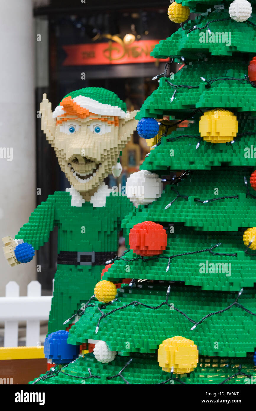 Santa's Train and elves with Teddy bears and presents made from Lego displayed in Covent Gardens London England Stock Photo