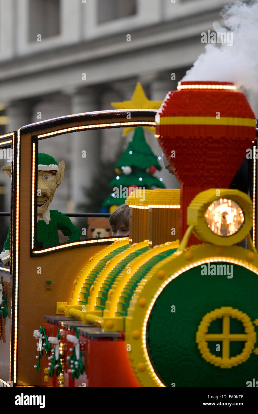 Santa's Train and elves with Teddy bears and presents made from Lego displayed in Covent Gardens London England Stock Photo