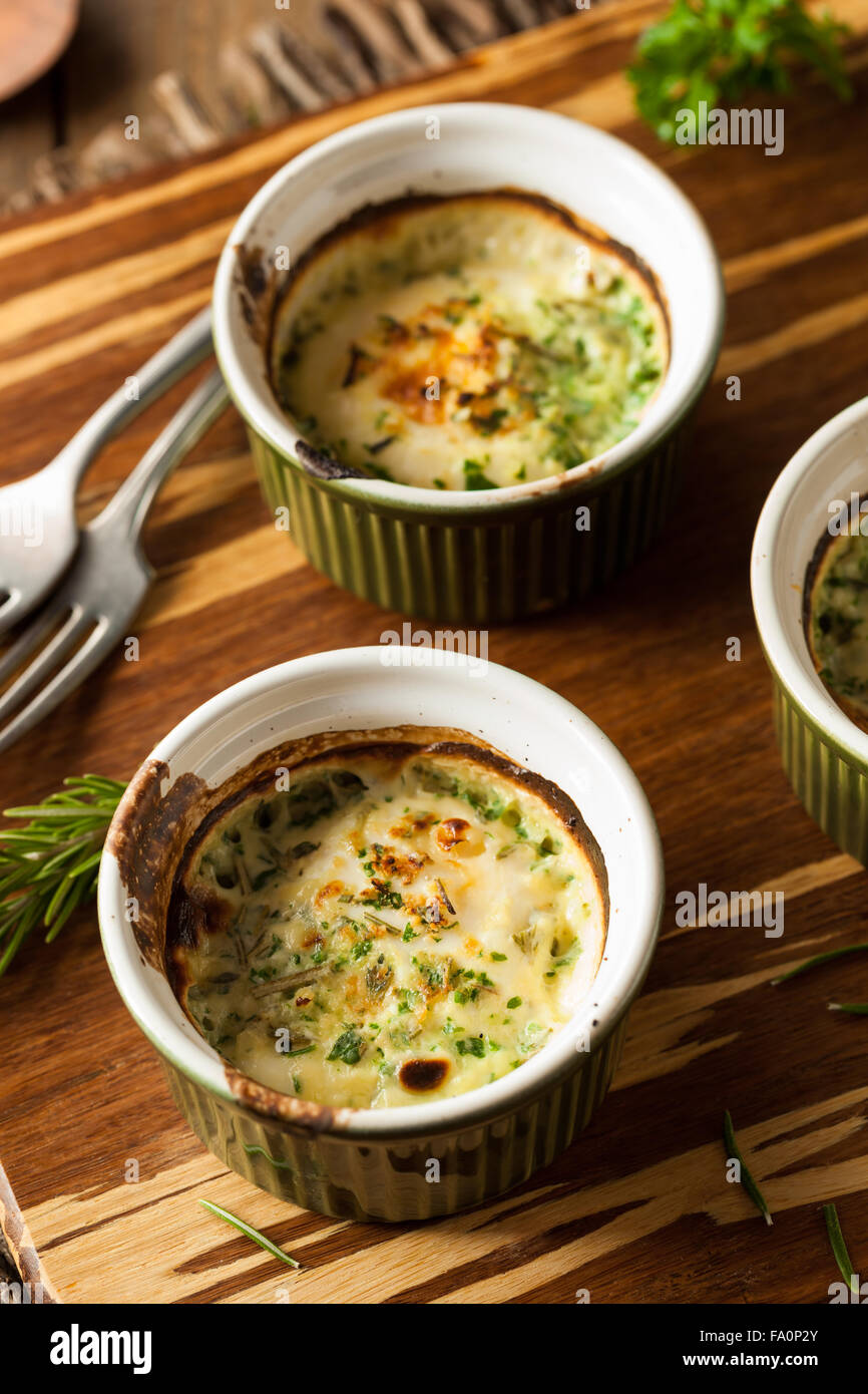 Cream Egg Bake in Ramekin with Fresh Herbs Stock Photo Alamy