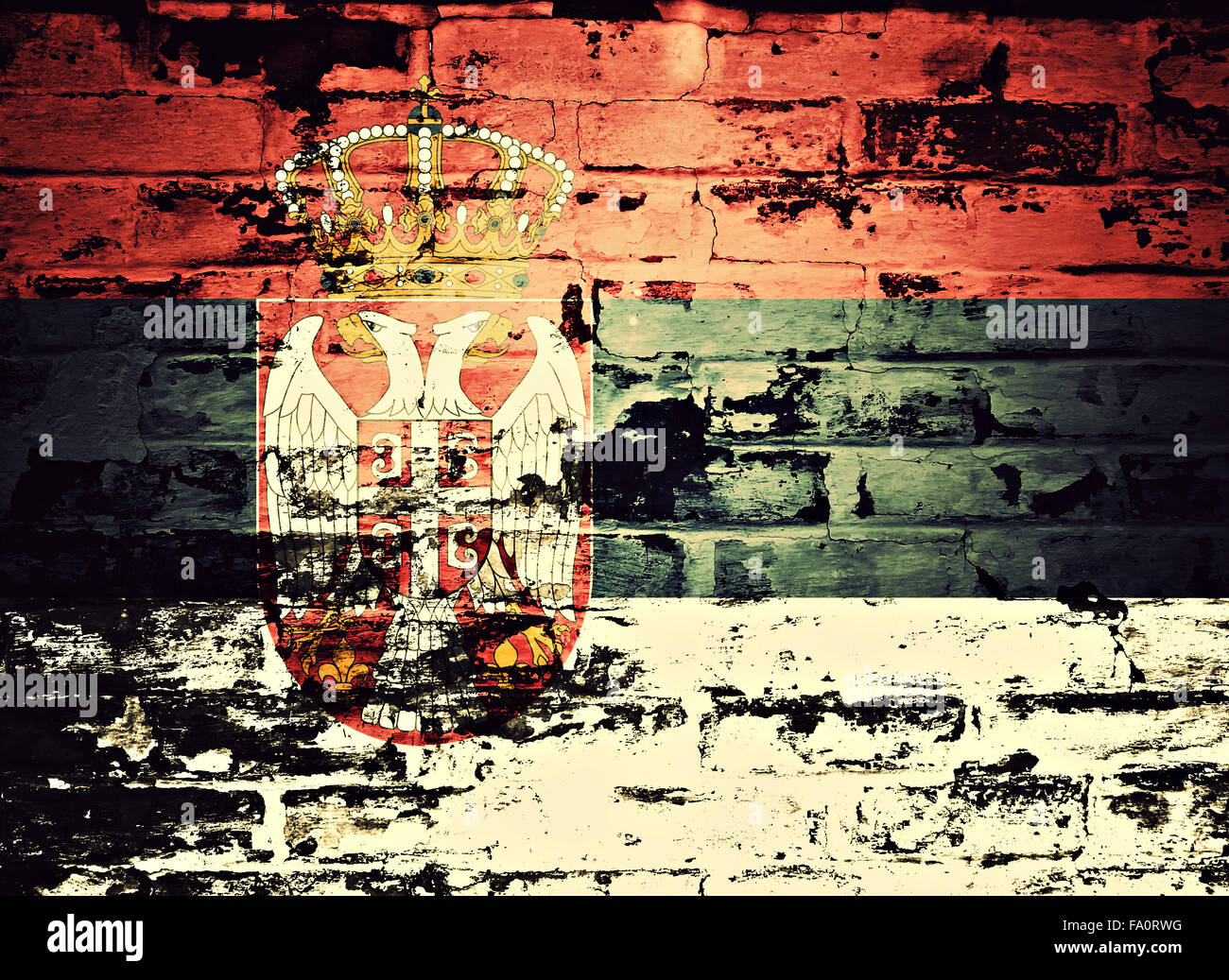 flag of Serbia painted on brick wall Stock Photo