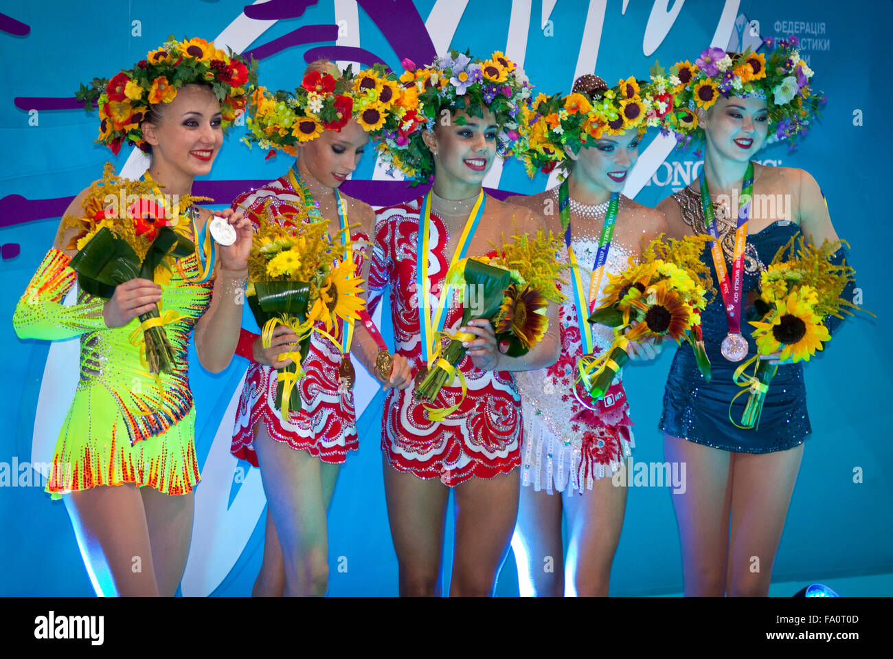 KYIV, UKRAINE - AUGUST 29, 2013: All medalists of 32nd Rhythmic Gymnastics World Championship stand at podium on August 29, 2013 in Kyiv, Ukraine Stock Photo