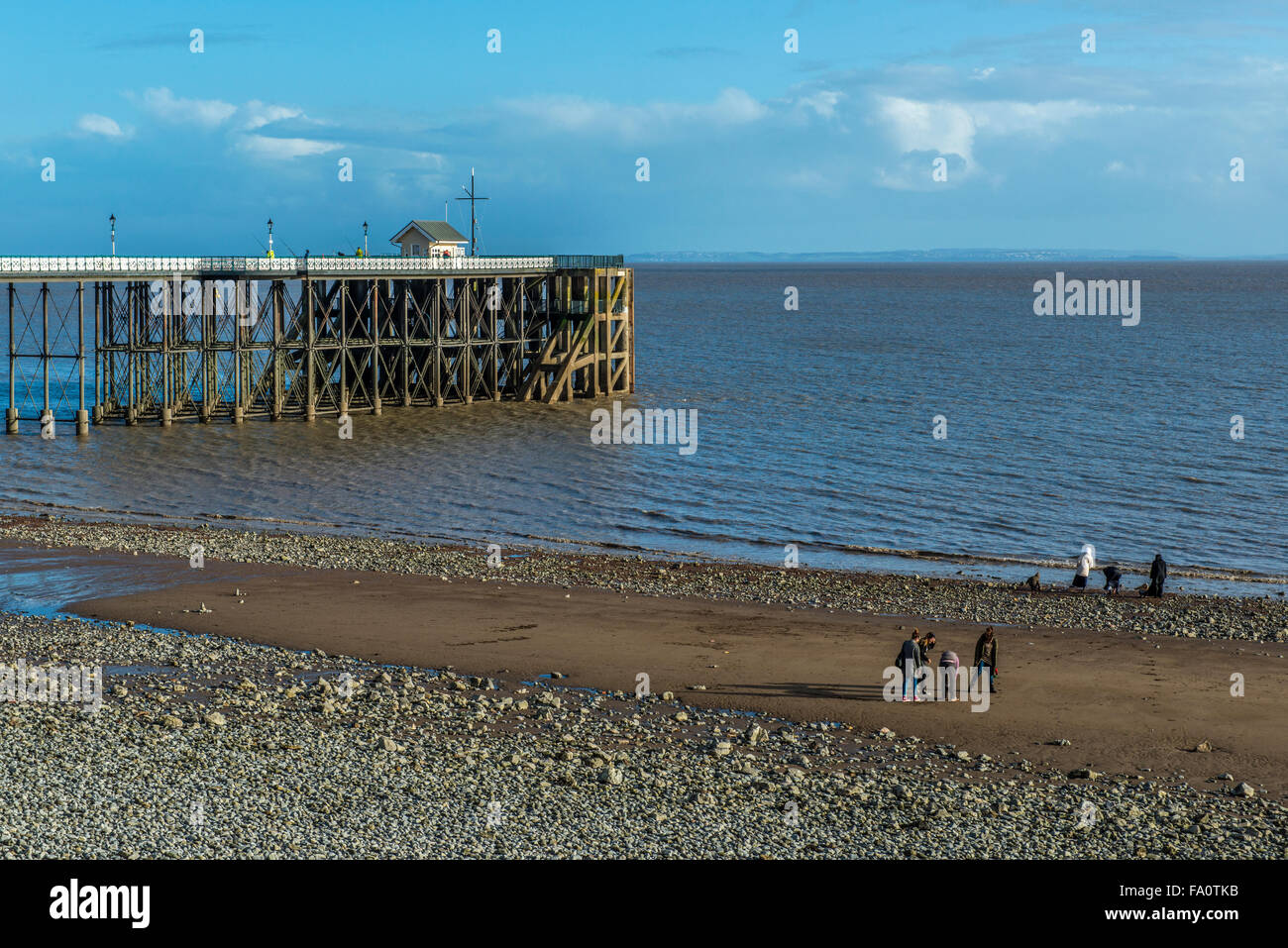 Penarth Pier and Beach with people playing on the Beach, in the Vale of Glamorgan, South Wales Stock Photo