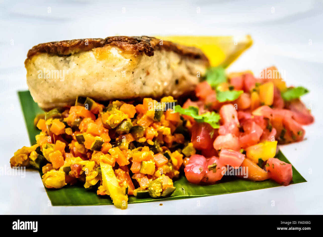 Pan fried white snapper Stock Photo - Alamy