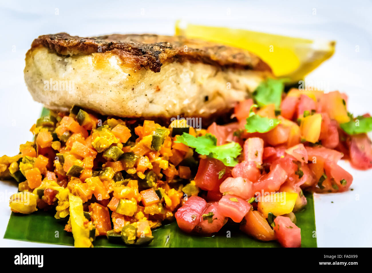 Pan fried white snapper Stock Photo - Alamy