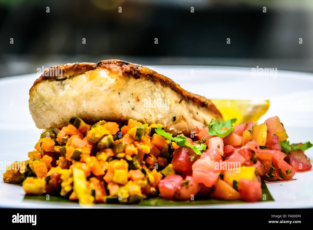 Pan fried white snapper Stock Photo - Alamy