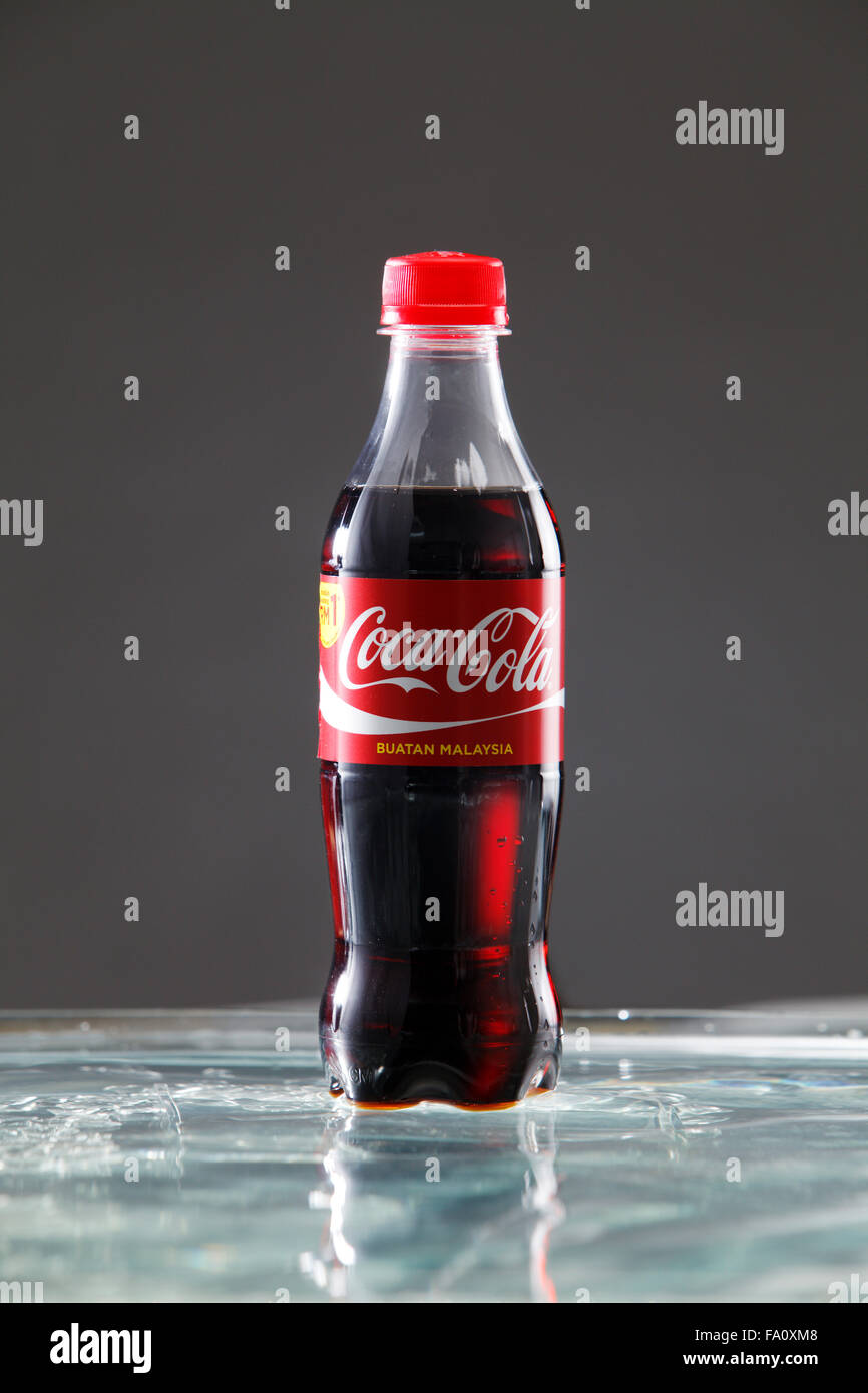 kuala Lumpur,Malaysia 16th April 2015,Editorial photo of Classic Coca-Cola Bottle with water splash Stock Photo