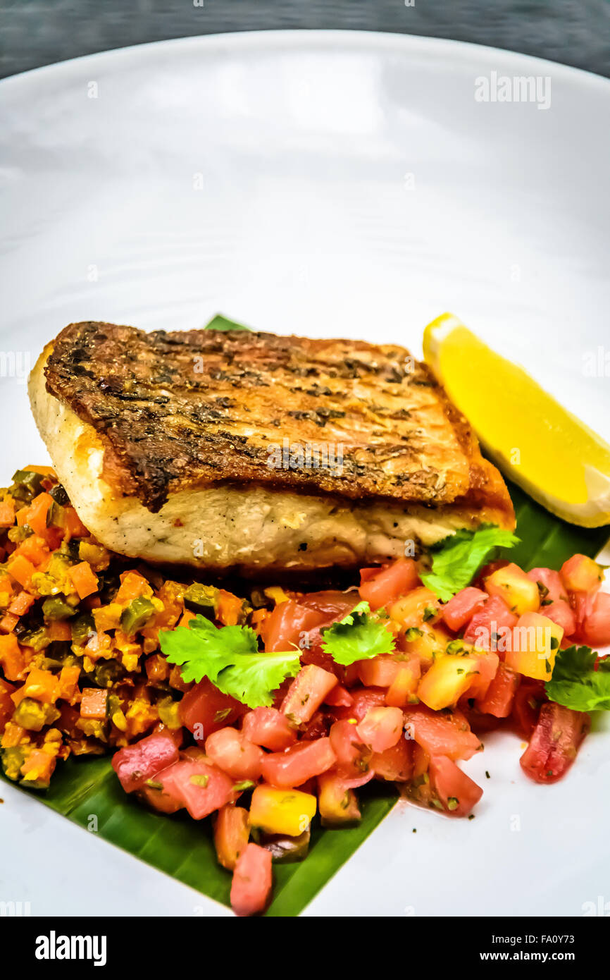 Pan fried white snapper Stock Photo - Alamy