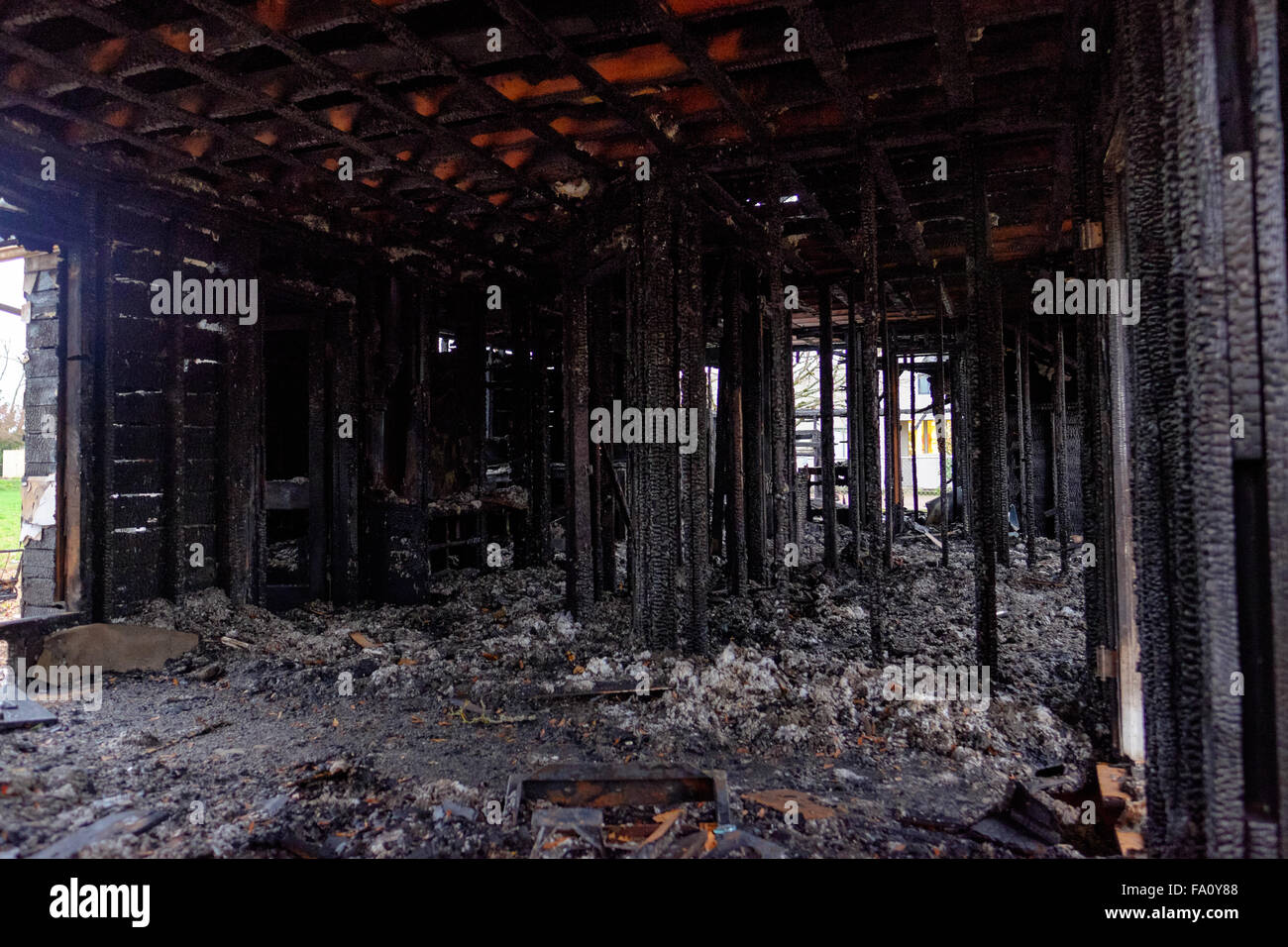 House burned almost completely in a major fire leaving only the damaged remains of this home. Stock Photo