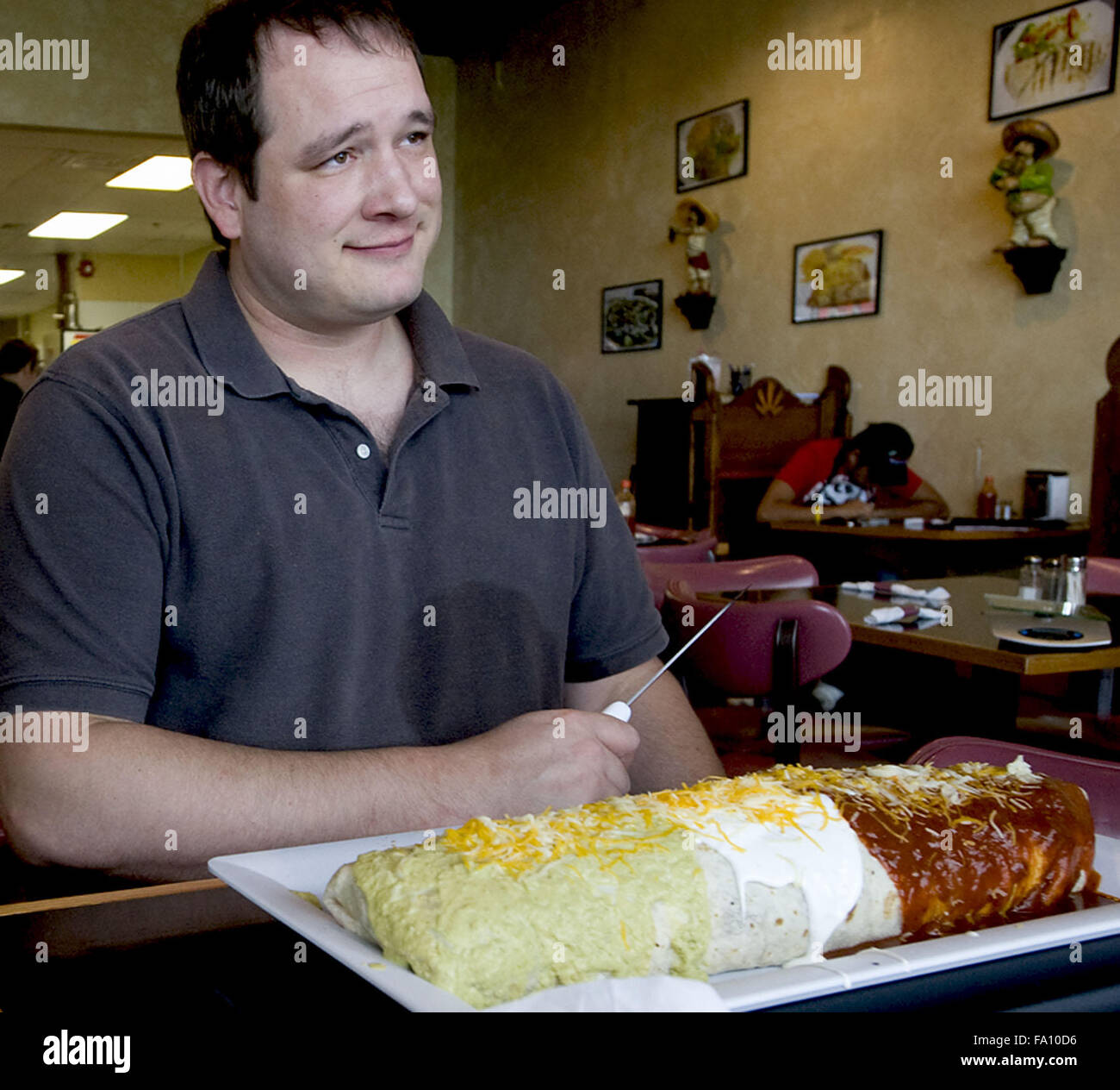 Ionia, MI, USA. 8th Sep, 2012. Drew Thompson looks confident and cocky before attempting to eat a 5 pound burrito at El Mariachi Mexican Grill in Ionia, MI. Credit:  Mark Bialek/ZUMA Wire/Alamy Live News Stock Photo