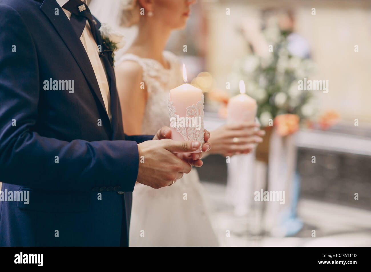 hands candle church wedding Stock Photo Alamy
