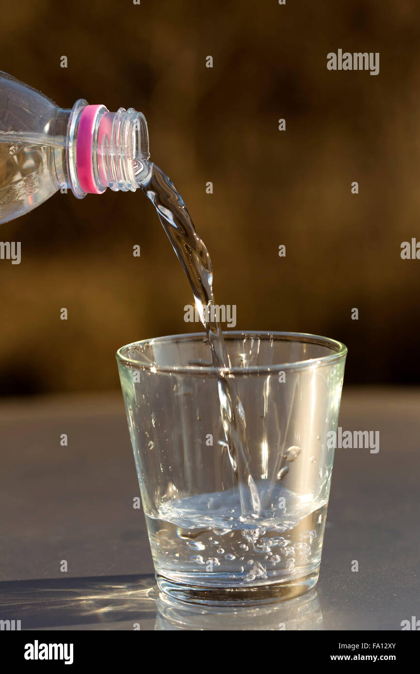 Small glass water bottle stock photo. Image of natural - 143132342