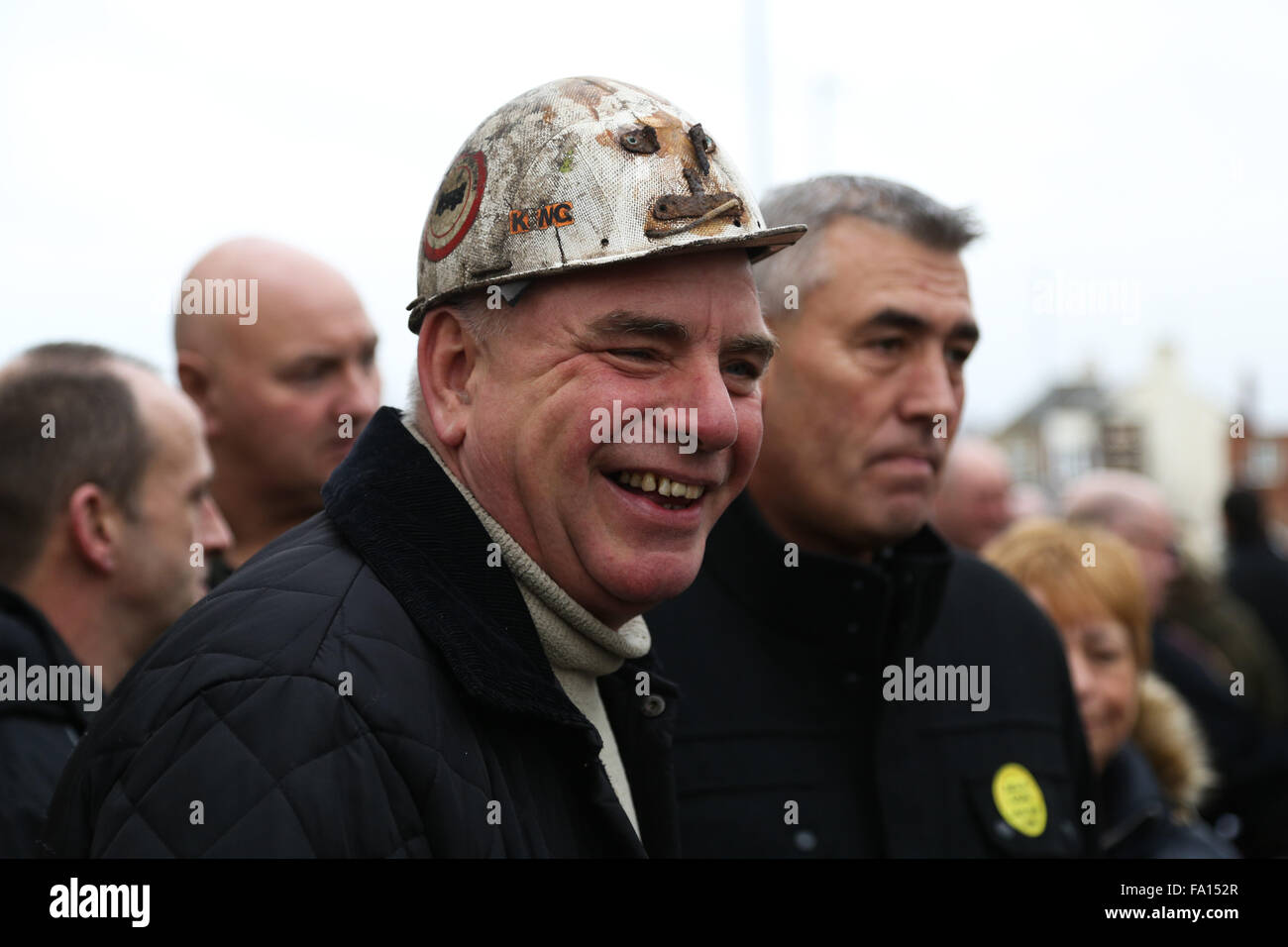 Miners march through Knottingley in West Yorkshire after the closure of the nearby Kellingley Colliery yesterday. Known locally as the Big K, Kellingley was the last remaining deep coal mining operating in the UK. The closure marks the end of what was once a giant industry in Britain. Credit:  Ian Hinchliffe/Alamy Live News Stock Photo