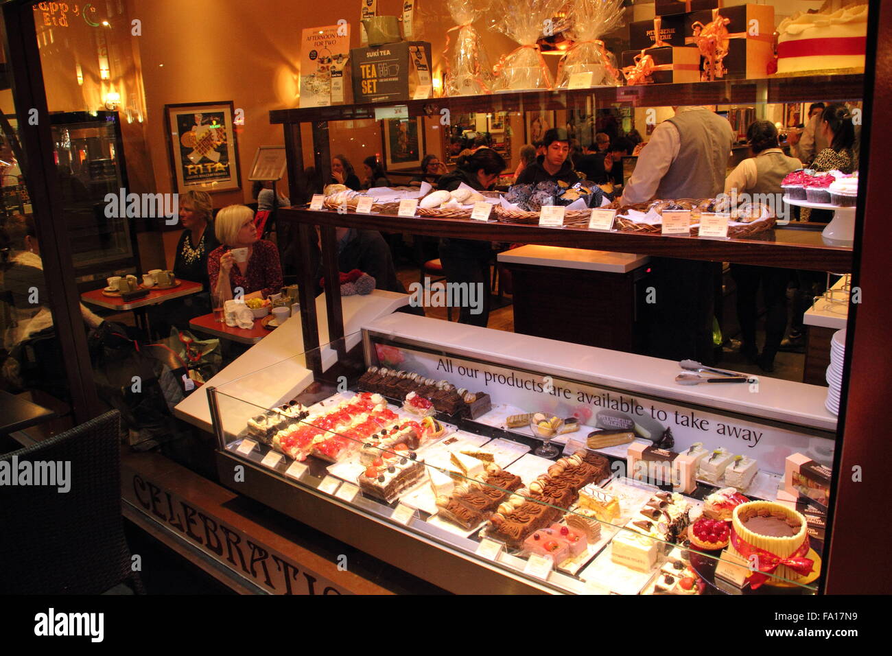 Pastries and cakes on display for sale in the shop window of Patisserie Valerie in Sheffield city centre, Yorkshire England UK Stock Photo