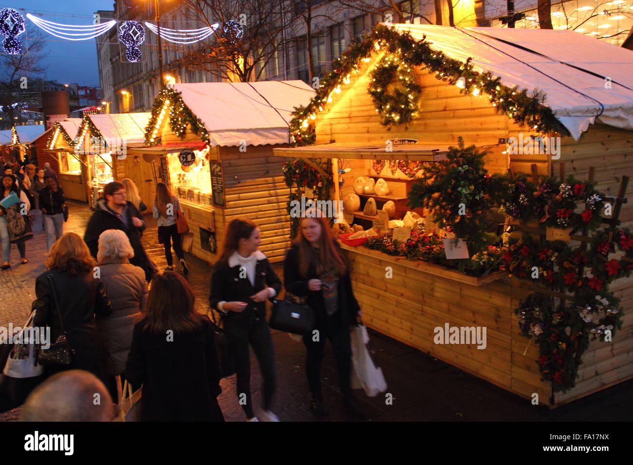 Shoppers at the Christmas market on Fargate in Sheffield city centre, Yorkshire England UK Stock Photo