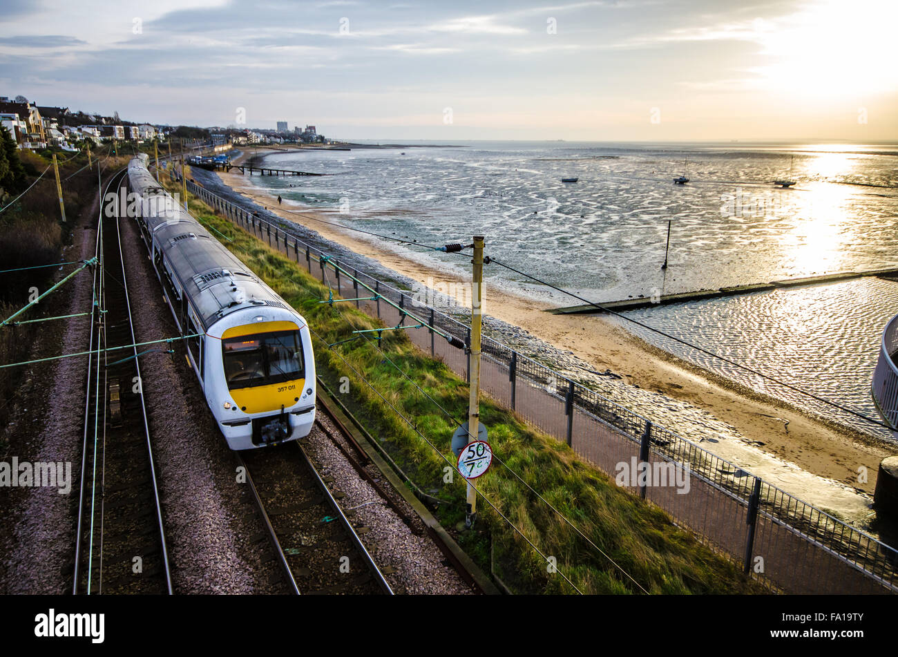 c2c is a British train operating company owned by Trenitalia running from London to Shoebury. Class 357 electric unit passing Thames Estuary Chalkwell Stock Photo