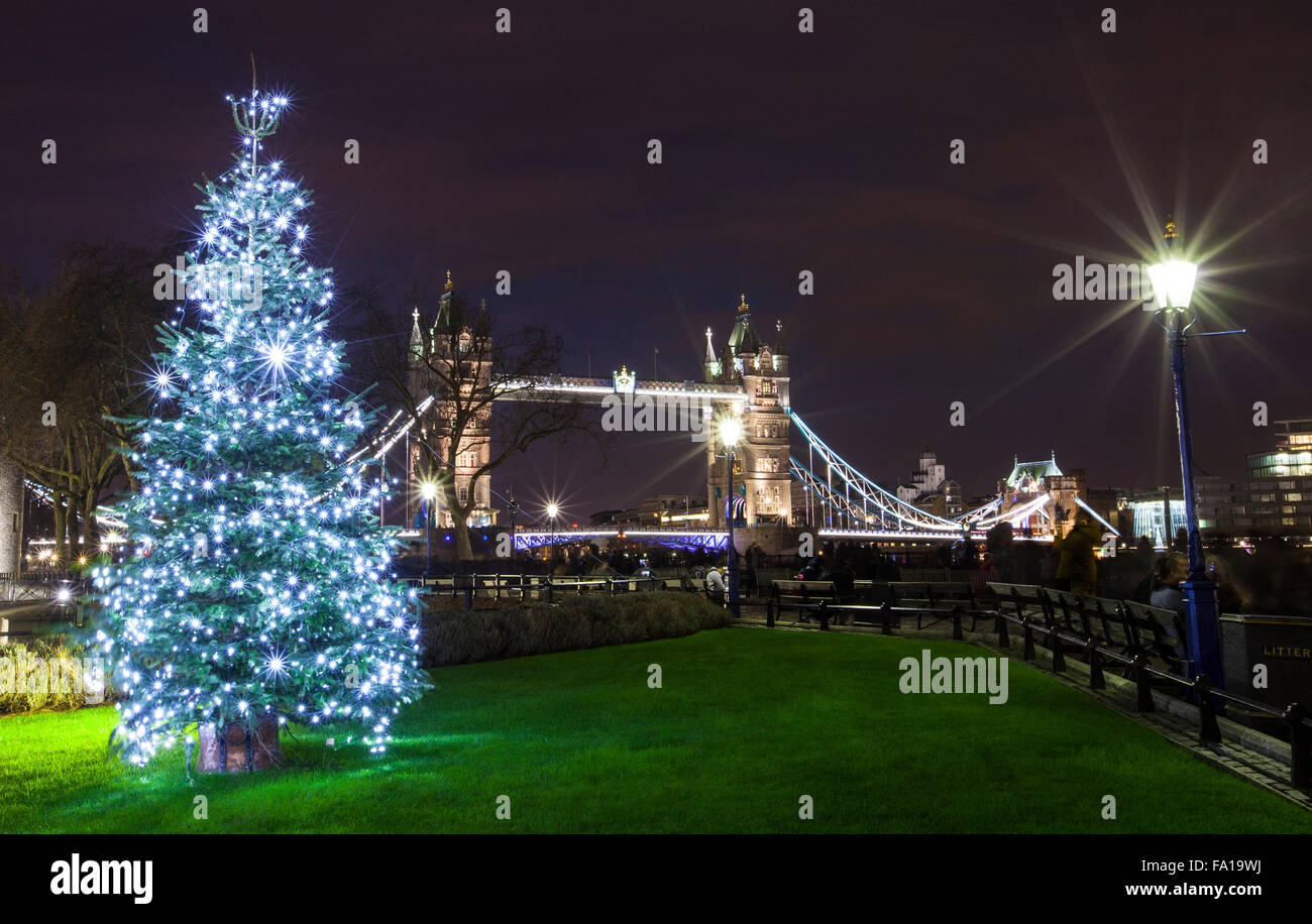 Tower bridge and the tower of london with christmas lights hires stock