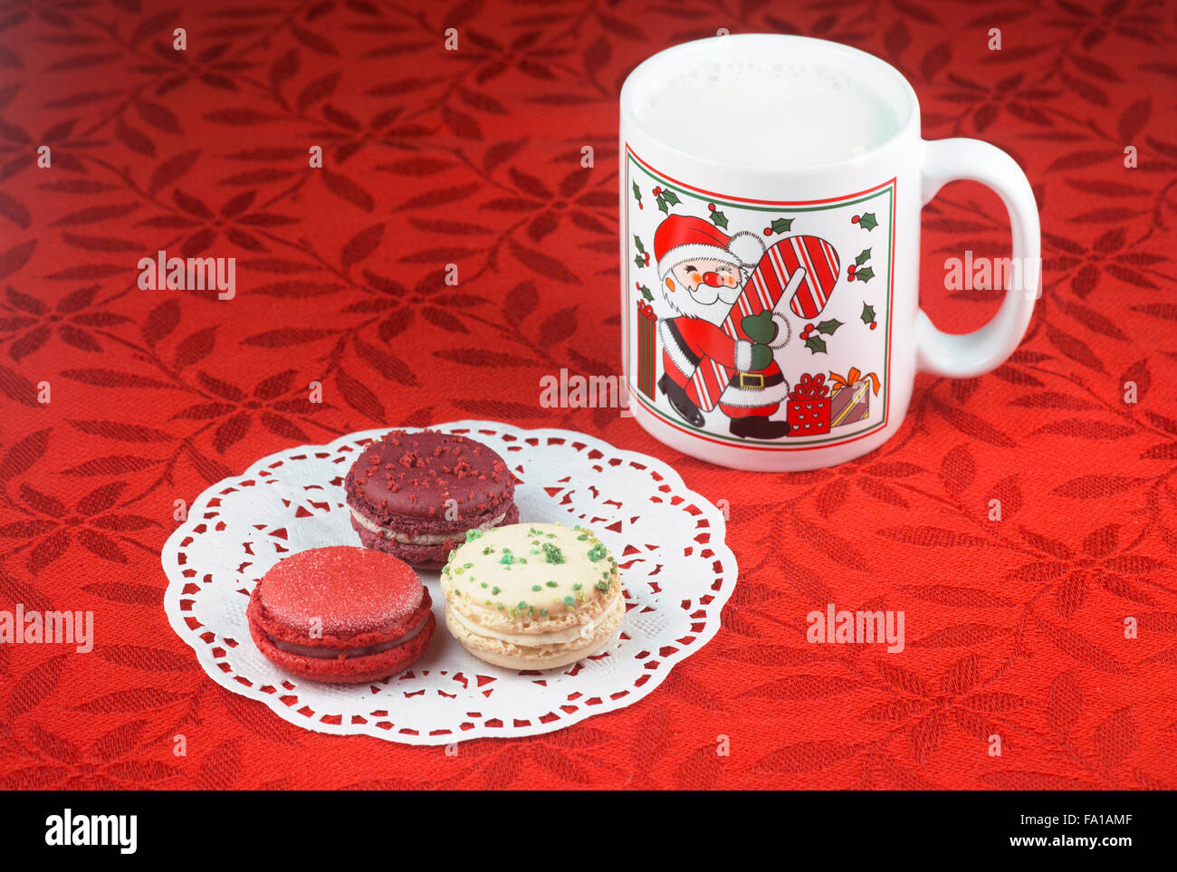 Cookies and milk for Santa Claus on Christmas tablecloth Stock Photo